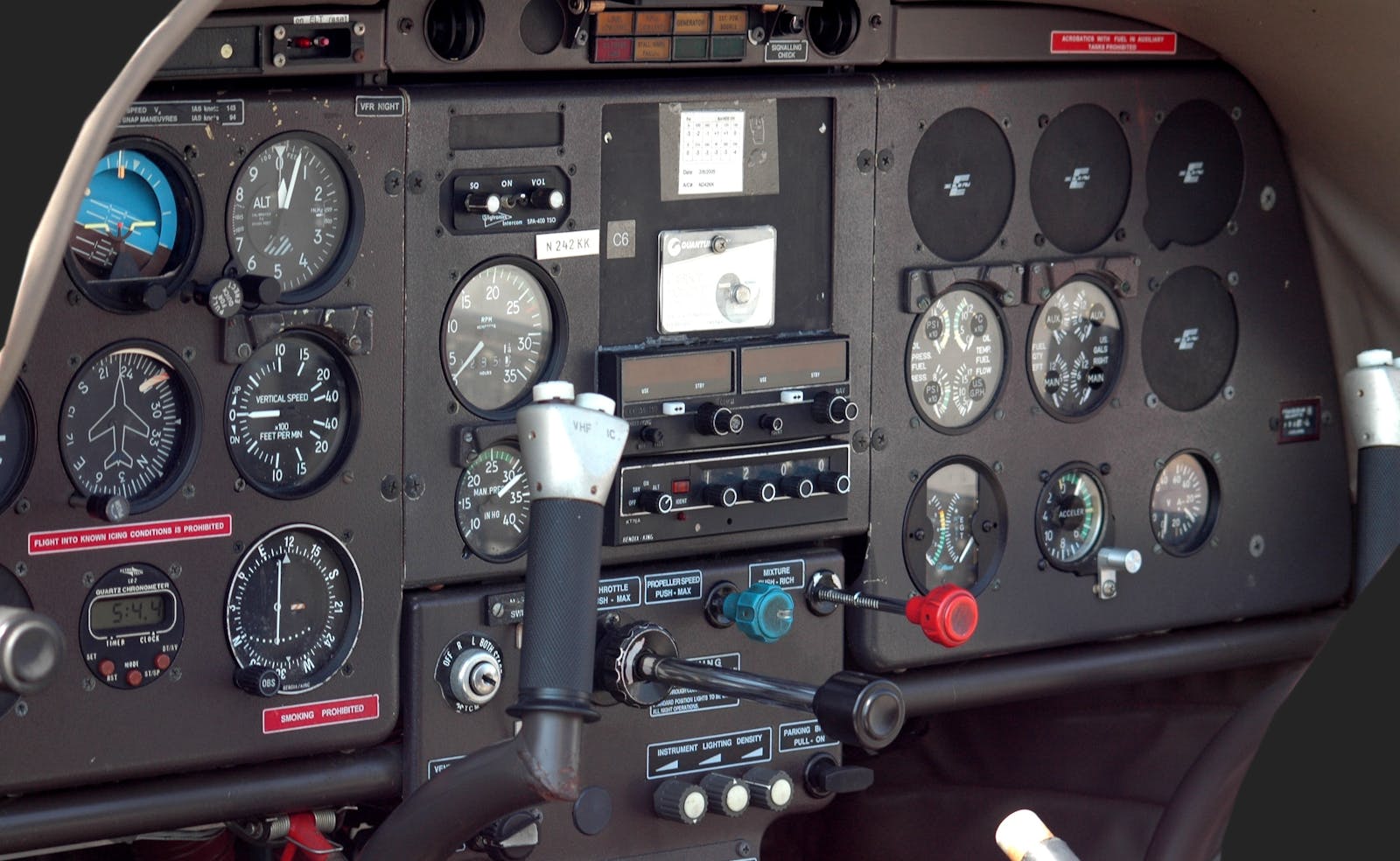 A general-aviation cockpit instrument panel — the world Scott commutes from.